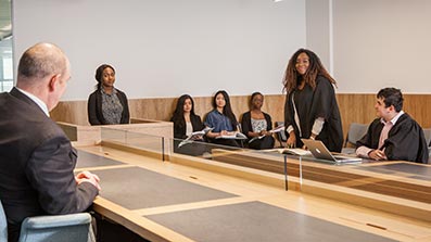 Students using a mock court room in Bristol Business School Students using a mock court room in Bristol Business School