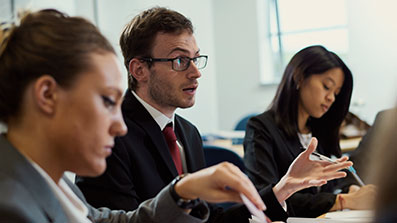 Business people in a classroom discussion