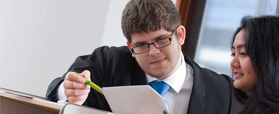 UWE Professional law students examining papers