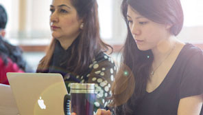 A female student working on a laptop