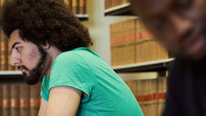 Two students studying in a library